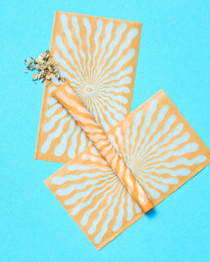 Cute printed sunny joint rolling papers by Field Trip.