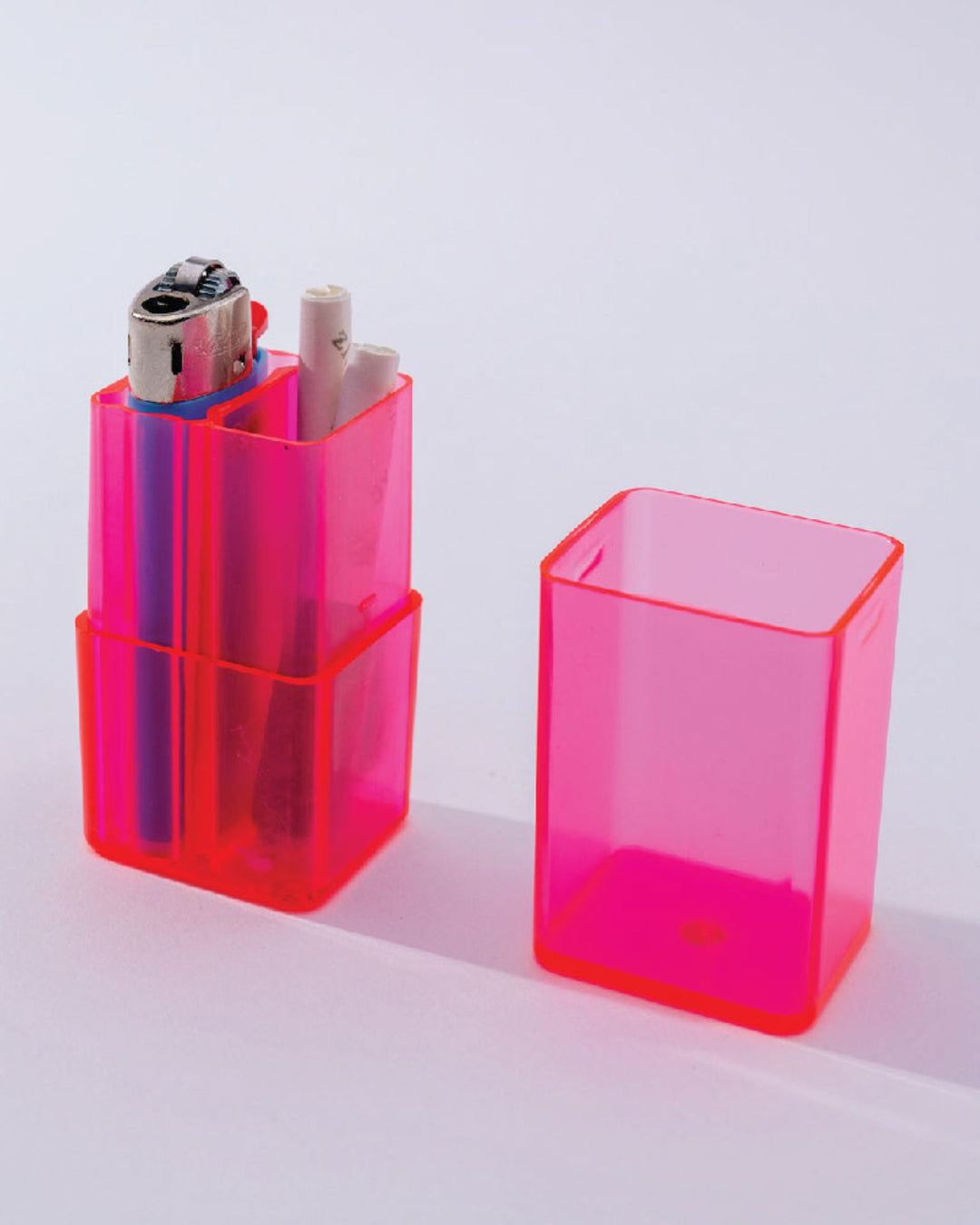 Pink mini cannabis storage container.