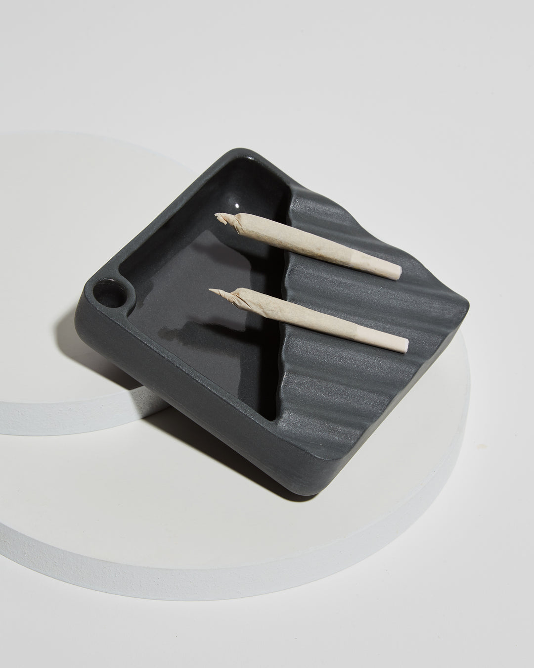 jaunt black ceramic ashtray joint holder