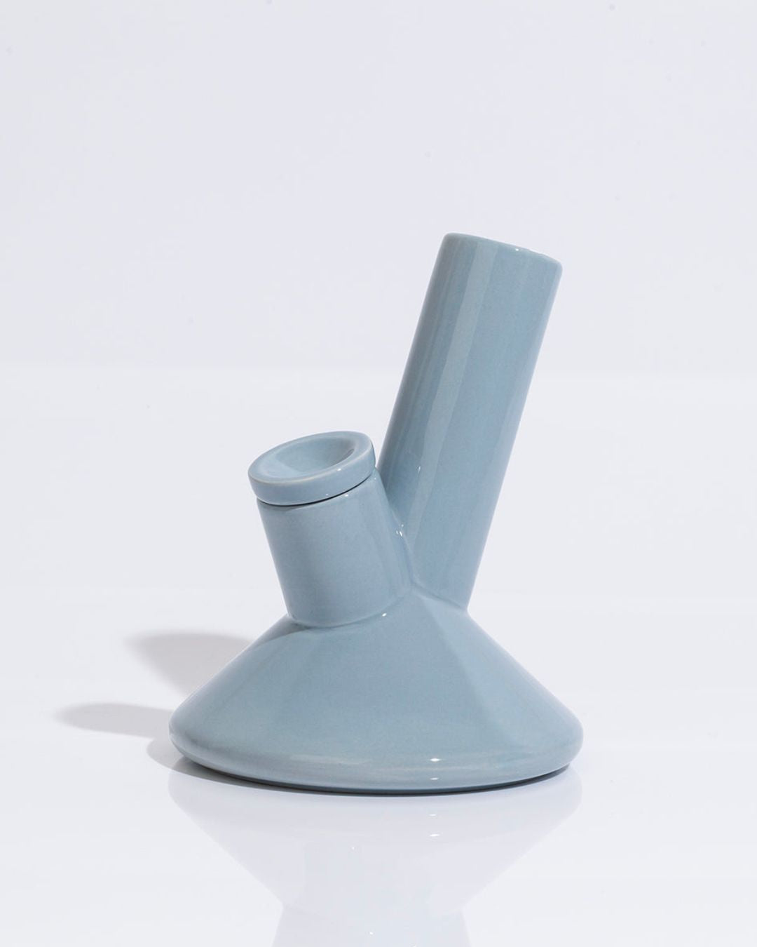 Luxury ceramic bong in sky blue on a white background.