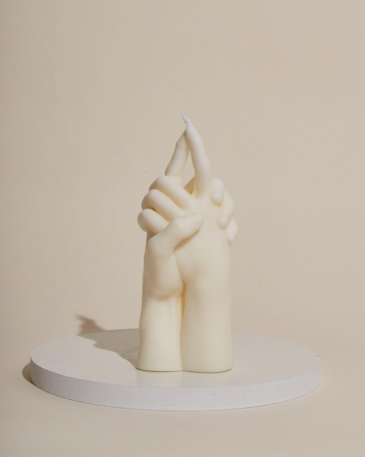 hand sculpture white unscented candle