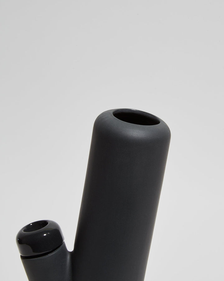 Large mouth opening of black-color sleek ceramic bong.