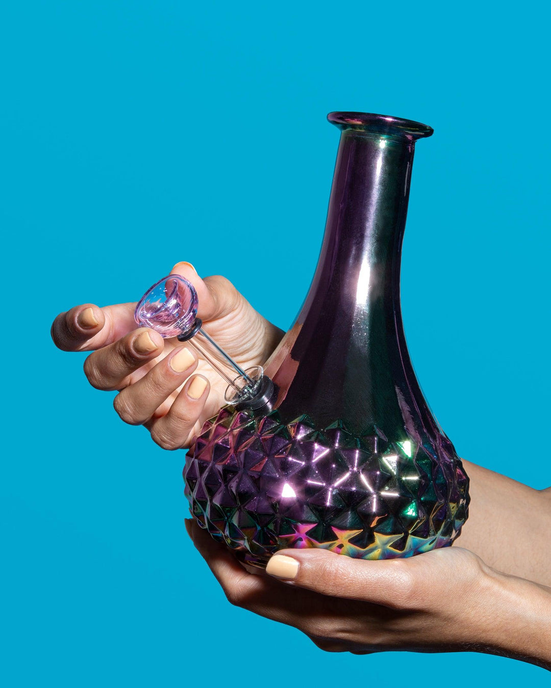 female holding bowl and aurora vase bong