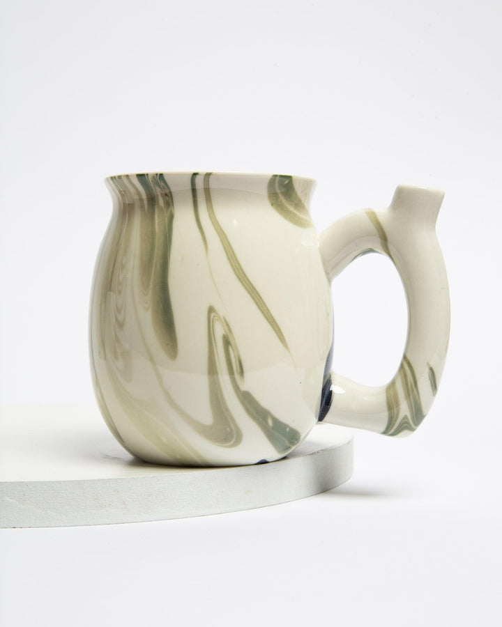 green ceramic mug hollow pipe handle