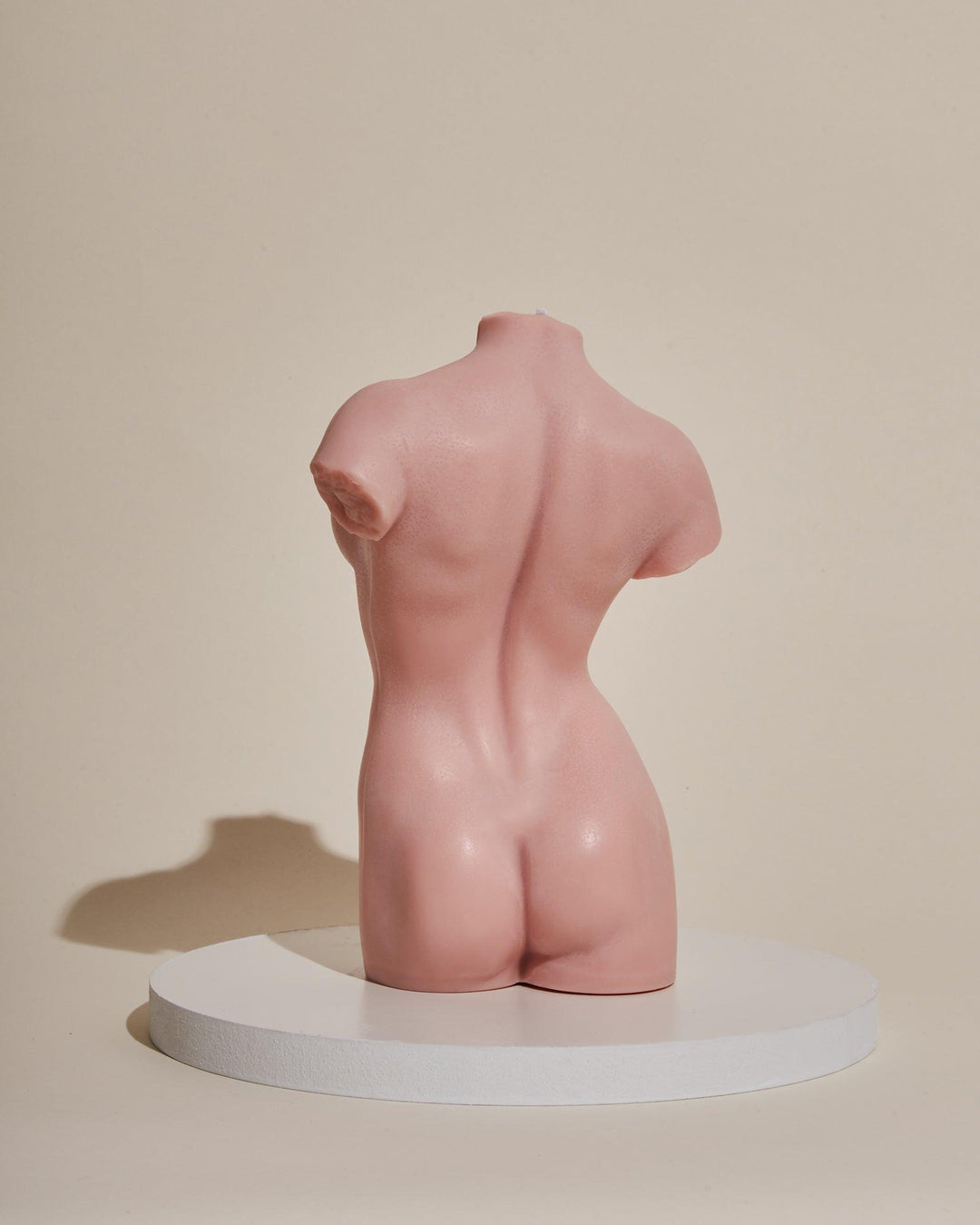 rose pink female body sculpture candle