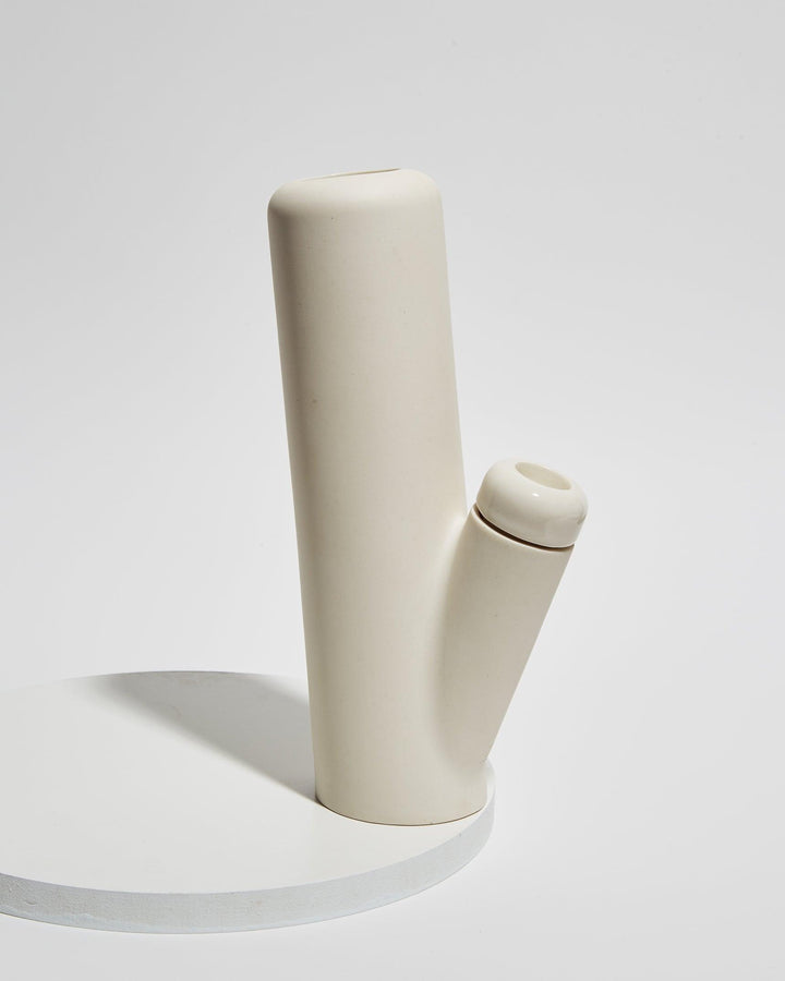 Sleek white-color modern design jaunt bough bong water pipe.