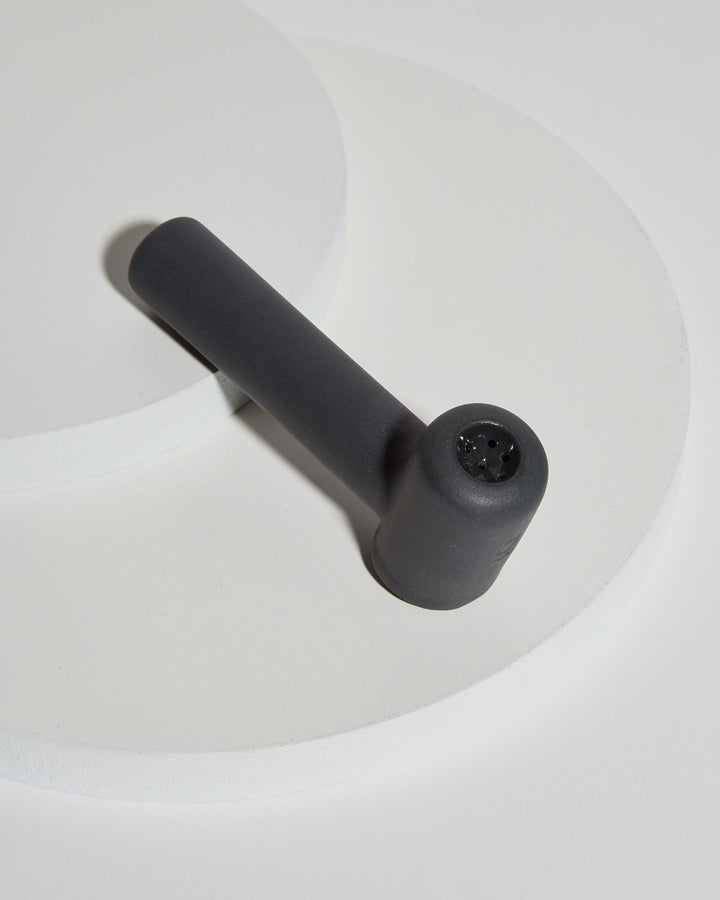 Jaunt handmade ceramic twig hand pipe in slate black.