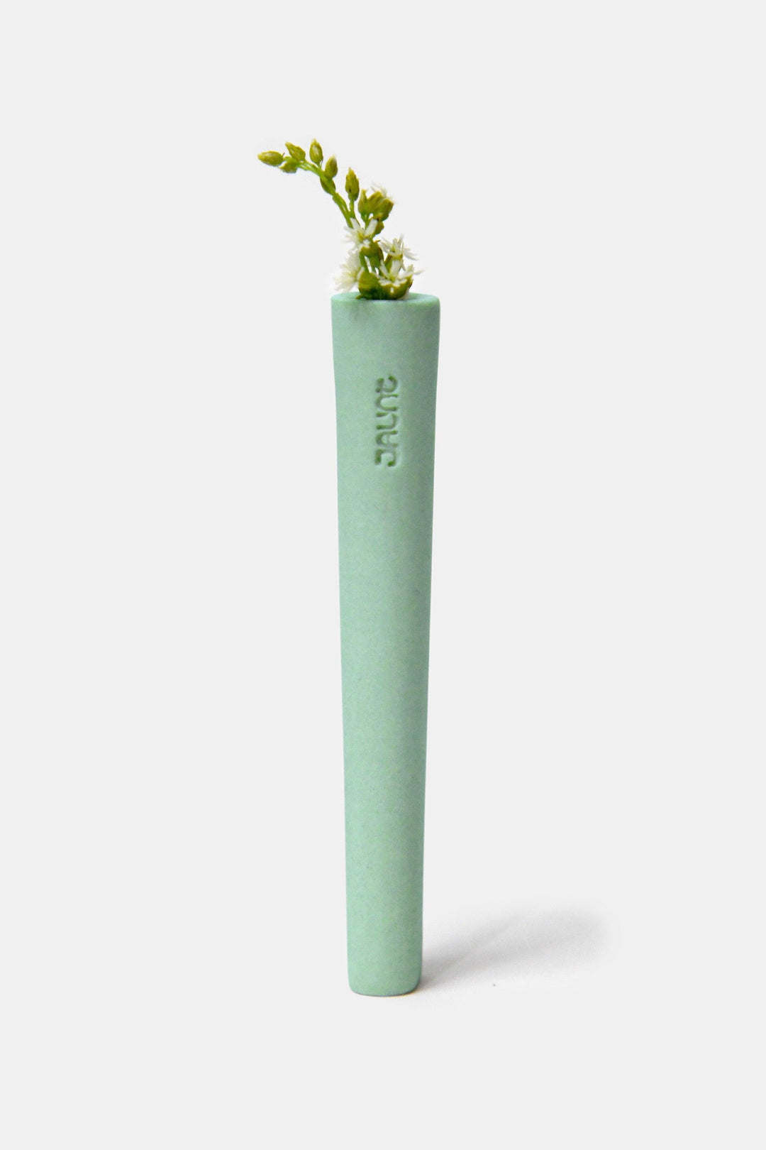 Cannabis one-hitter ceramic pipe in mint green.