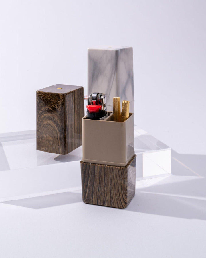 Luxury designer cannabis joint and lighter storage container.