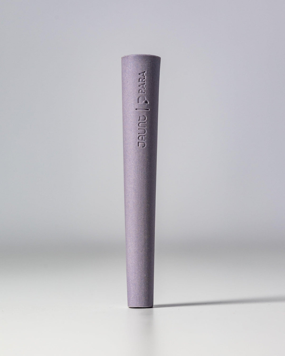 Lavender ceramic one-hitter weed pipe.