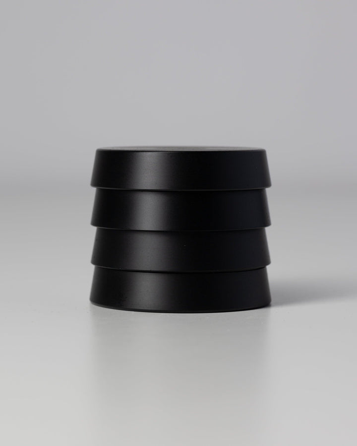 minimal four tier black grinder