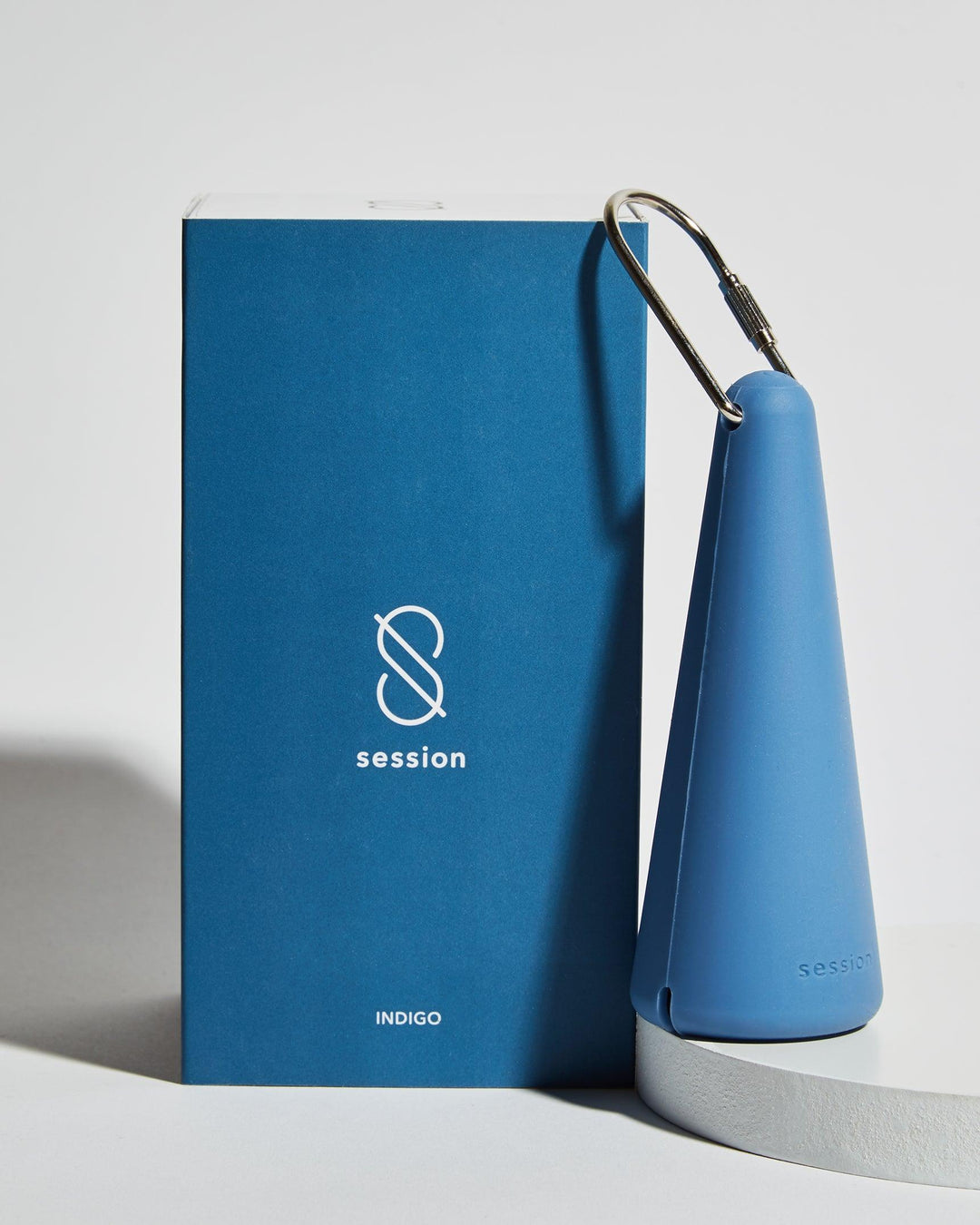 session goods herb pipe with silicone sleeve and packaging in indigo blue
